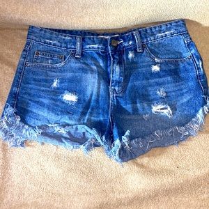 Women’s free people ripped jean shorts size 29 w